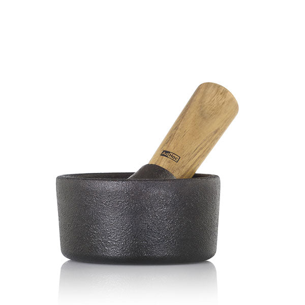 Mortier et pilon en fonte et bois d