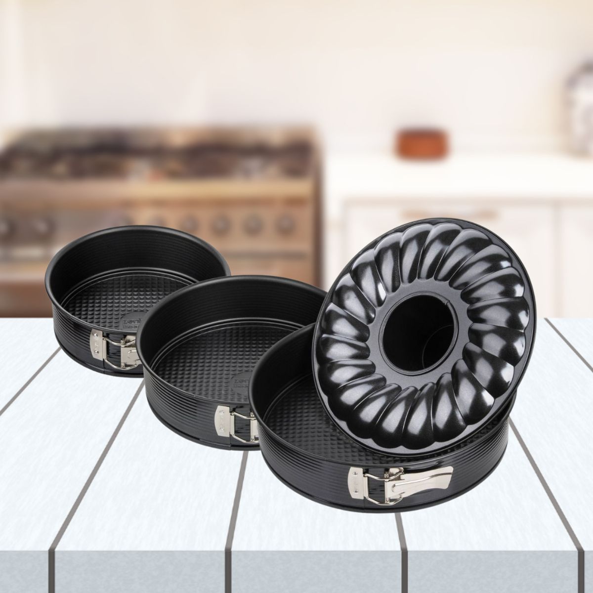 Set de 2 moules à manqué et 1 moule à manqué et savarin diamètres 20, 24 , 28 cm Zenker Black Metallic Zenker - Mathon - 2